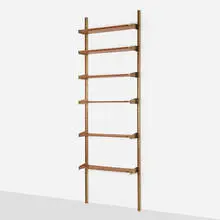 attribution Pierluigi Spadolini, Wall-mounted shelving unit, c. 1956, Italian walnut, brass