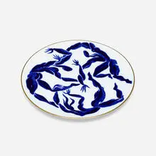 Bacchanale charger by Hervé van der Straeten, c. 1995, glazed and gilt porcelain, sold Aug 2024