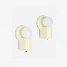 William Lescaze, Sconces, pair, 1936, glazed porcelain, Bakelite, brass-plated steel