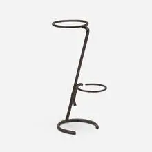 Plant stand by Jacques Adnet, c. 1965, leather, iron, sold Aug 2024