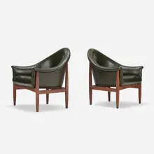 Lounge chairs, pair by Milo Baughman, c. 1975, walnut, vinyl upholstery, sold Aug 2024
