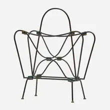Jacques Adnet, Magazine rack, c. 1965, enameled steel, leather