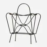 Jacques Adnet, Magazine rack, c. 1965, enameled steel, leather