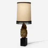 Buddha table lamp by attribution James Mont, c. 1960, painted plaster, brass, fabric shade with plastic beads, sold Aug 2024