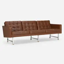 Sofa by Karl-Erik Ekselius, c. 1965, leather, chrome-plated steel, teak, sold Jul 2024