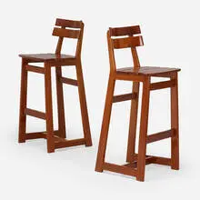Barstools, pair by Sergio Rodrigues, c. 1978, mahogany, sold Jul 2024