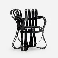 Cross Check armchair by Frank Gehry, 1992 / 1995, painted laminated wood, leather, sold Jul 2024