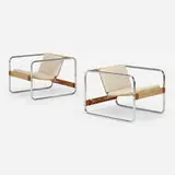 Habitat 67 lounge chairs, pair by Michel Dallaire for Jacques S. Guillon & Associates, 1967, chrome-plated steel, canvas, upholstery, cherry, sold Jul 2024
