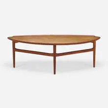 Coffee table by Finn Juhl, 1951, walnut, sycamore, sold Jul 2024
