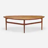 Coffee table by Finn Juhl, 1951, walnut, sycamore, sold Jul 2024