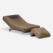Living Center chaise lounge and ottoman by Joe Colombo, 1970, aluminum, chrome-plated metal, upholstery, plastic, laminate, sold Jun 2024
