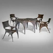 Custom outdoor dining set from the Kellogg Doolittle Residence, Joshua Tree by John Vugrin, c. 1994, patinated steel and copper, sold Jun 2024