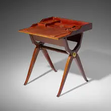 Early folding desk by Hermès, c. 1930, mahogany, leather, brass, sold Jun 2024