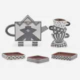Flattened teapot, flattened vase, and three nesting plates by Kazuko Matthews, sold Jan 2019