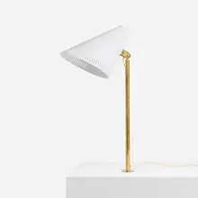 Table lamp by Paavo Tynell, c. 1955, brass, lacquered aluminum, sold May 2024