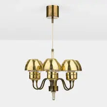 Chandelier by Hans Agne Jakobsson, c. 1960, brass, plastic, sold May 2024
