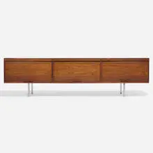 Cabinet by Kai Kristiansen, c. 1965, rosewood, matte chrome-plated steel, sold May 2024