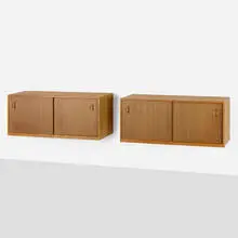 Wall-mounted cabinets, pair by Erik Wörts, c. 1960, oak, wenge, sold May 2024
