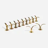 Ivar Ålenius-Björk, Lily candlesticks, collection of eleven, brass