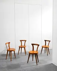 Charlotte Perriand, Four L'Équipement de la Maison Three Legged Chairs, circa 1947, oak