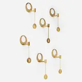 Wall-mounted candleholders, set of six by Arthur Pe, c. 1965, brass, sold May 2024