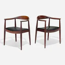 The Chairs, pair by Hans J. Wegner, teak, vinyl, sold May 2024