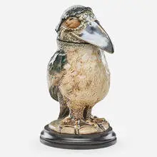 Robert Wallace Martin for Martin Brothers Pottery, Monk bird tobacco jar, England