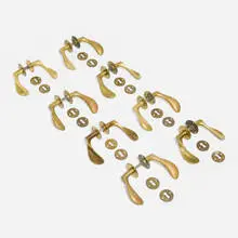AJ door handles for the SAS Royal Hotel, set of eight by Arne Jacobsen, 1956, brass, sold May 2024