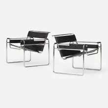 Wassily lounge chairs, pair by Marcel Breuer, chrome-plated steel, leather, sold Apr 2024