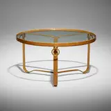 Jacques Adnet, Coffee table, c. 1955, saddle-stitched leather over steel, brass, glass
