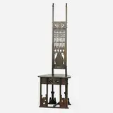 Rare cut-out tall-back hall chair by Charles Rohlfs, sold Jan 2019