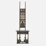 Rare cut-out tall-back hall chair by Charles Rohlfs, sold Jan 2019