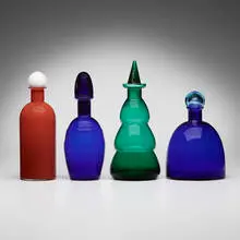 Carlo Moretti, Collection of four bottles with stoppers, c. 1980, blown glass