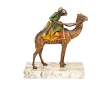 Franz Bergman, cold painted bronze model of a North African man riding a camel, cold painted bronze