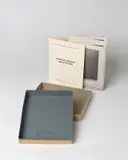 Graue Bilder by Gerhard Richter, 1974, Orig.-Kartonbox, Innendeckel mit grauer Farbe gefasst, mit typ. bedr. doppels. Faltblatt und Karton-Leporello mit 12 Off, sold Nov 2019