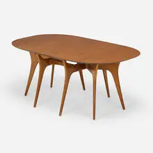 Custom Drop-leaf dining table by Vladimir Kagan, c. 1954, mahogany, sold Mar 2024