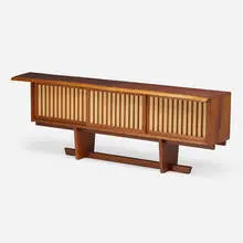 George Nakashima, Exceptional Triple Sliding Door cabinet, 1987, American black walnut, pandanus cloth