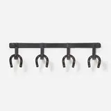 Jacques Adnet, Coat rack, c. 1955, saddle-stitched leather over steel