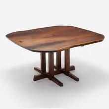 Frenchman's Cove dining table by George Nakashima, 1967, American black walnut, rosewood, sold Mar 2024