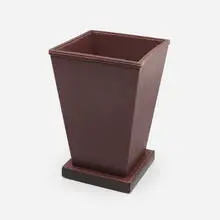 Paul Dupré-Lafon, Wastepaper basket, stained and stacked leather