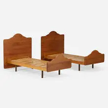 Twin-size bedframes, pair by Sam Maloof, c. 1988, walnut, maple, lacquered wood, plastic, sold Mar 2024