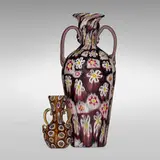 A Murrine vases, set of two by Fratelli Toso and Vittorio Zuffi, c. 1930, internally decorated glass murrine and applied handles, sold Feb 2024