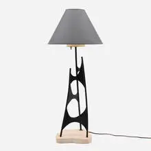 Table lamp by Maurizio Tempestini, c. 1955, enameled steel, travertine, paper shade, sold Jan 2024