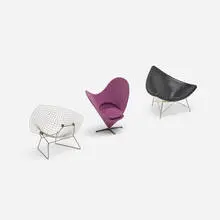 Collection of three miniature chairs by Vitra., leather, fiberglass reinforced plastic, steel, fabric, sold Jan 2024