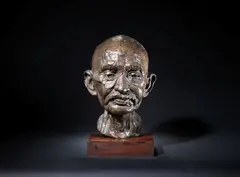 20th Century School, Head of Gandhi, indistinctly signed and dated '1981', bronze