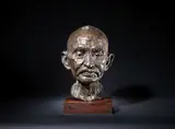 20th Century School, Head of Gandhi, indistinctly signed and dated '1981', bronze