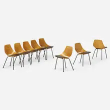 Tonneau chairs, set of eight by Pierre Guariche, 1954, birch plywood, enameled steel, vinyl, sold Jan 2024