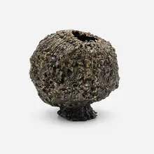 Moon vase by James Bearden, 2021, plasma-etched steel and bronze with metallic polywash finish, sold Jan 2024