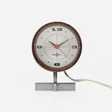 Table clock, model 663 by Arthur Umanoff, c. 1955, rosewood, chrome-plated steel, aluminum, acrylic, sold Jan 2024