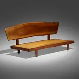 Daybed with back by George Nakashima, 1973, American black walnut, upholstery, sold Dec 2023